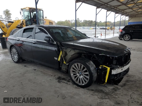 2011 BMW 7 Series 750i xDrive with VIN WBAKC6C56BC394810, listed as a Copart auction lot 79025014 with 152,399 mi miles and Salvage title. Bid and sale history available at DreamBid. Image 4.