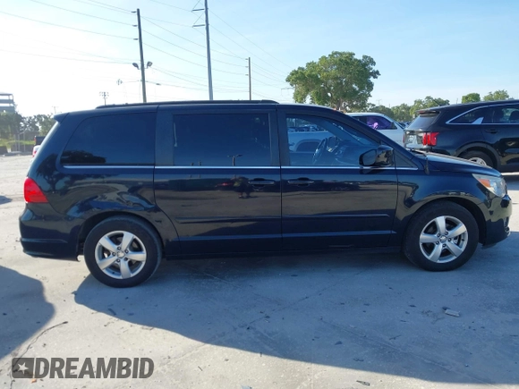 2011 Volkswagen Routan SE with VIN 2V4RW3DG5BR668194, listed as a IAAI auction lot 42483379 with 203,945 mi miles and . Bid and sale history available at DreamBid. Image 13.