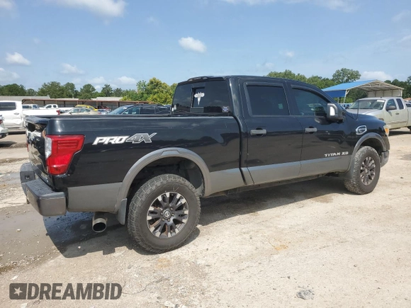 2016 Nissan Titan Platinum Reserve with VIN 1N6BA1F40GN512437, listed as a Copart auction lot 63521325 with 203,879 mi miles and Clean title. Bid and sale history available at DreamBid. Image 3.
