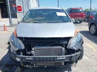 2013 Kia Rio LX with VIN KNADM5A33D6307061, listed as a IAAI auction lot 42143985 with 66,621 mi miles and . Bid and sale history available at DreamBid. Image 6.