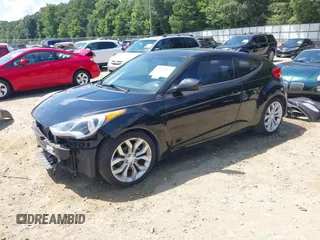 2012 Hyundai Veloster w/Black Int with VIN KMHTC6AD0CU056828, listed as a IAAI auction lot 42611623 with 136,242 mi miles and . Bid and sale history available at DreamBid. Image 18.