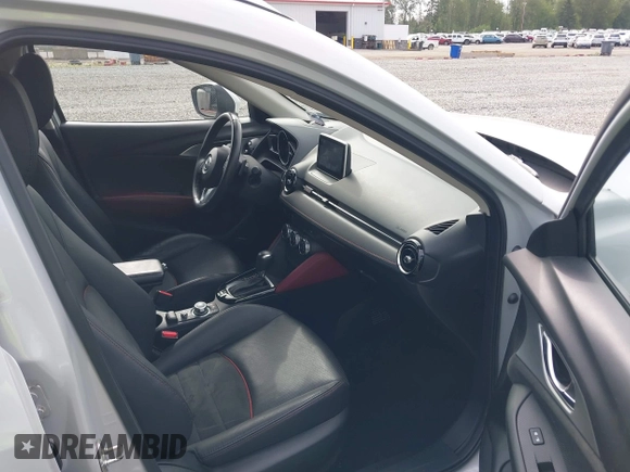 2017 Mazda CX-3 Grand Touring z VIN JM1DKFD70H0159621, wystawiony jako IAAI lot #42331482 z przebiegiem 55 166 mil mil oraz . Historia ofert i sprzedaży dostępna na DreamBid. Obrazek 5.