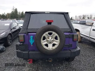 2018 Jeep Wrangler JK Unlimited Sport S with VIN 1C4BJWDG0JL847049, listed as a IAAI auction lot 41218525 with 90,588 mi miles. Bid and sale history available at carsss.com. Image 17.