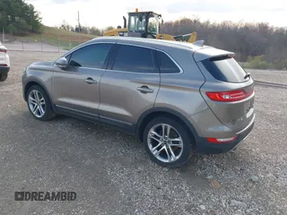 2016 Lincoln MKC Reserve with VIN 5LMCJ3D97GUJ31720, listed as a IAAI auction lot 41655116 with Not provided miles and . Bid and sale history available at DreamBid. Image 3.