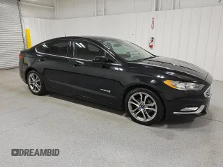 2017 Ford Fusion Hybrid SE with VIN 3FA6P0LU9HR216757, listed as a Copart auction lot 64430315 with 106,247 mi miles and Clean title. Bid and sale history available at DreamBid. Image 4.