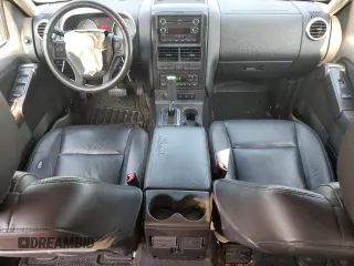 2010 Ford Explorer Sport Trac Limited with VIN 1FMEU3DE5AUF07077, listed as a Copart auction lot 66696134 with 163,753 mi miles and Salvage title. Bid and sale history available at DreamBid. Image 8.