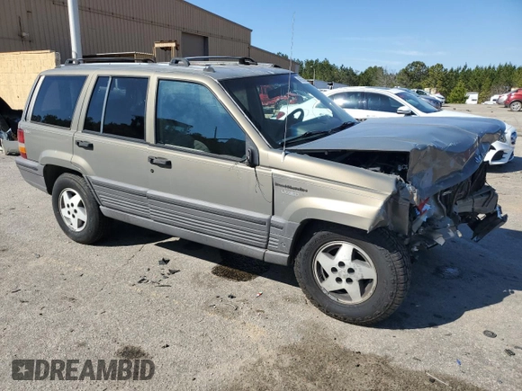 1995 Jeep Grand Cherokee Laredo with VIN 1J4GZ58S9SC706256, listed as a Copart auction lot 46635685 with 388,975 mi miles and Salvage Title. Bid and sale history available at carsss.com. Image 4.