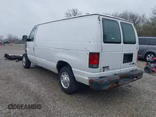 2012 Ford Econoline Cargo Commercial with VIN 1FTNE1EW0CDB10750, listed as a IAAI auction lot 41939696 with 180,042 mi miles. Bid and sale history available at carsss.com. Image 3.