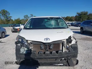 2014 Toyota Sienna SE with VIN 5TDXK3DC4ES487772, listed as a IAAI auction lot 41218295 with 153,368 mi miles and . Bid and sale history available at DreamBid. Image 12.