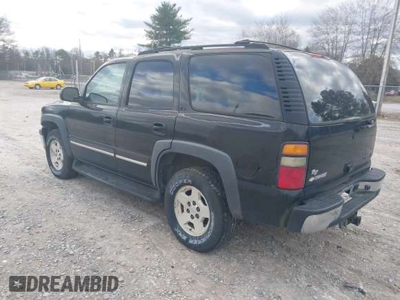 2004 Chevrolet Tahoe LT with VIN 1GNEC13Z74J314927, listed as a IAAI auction lot 41231288 with 195,809 mi miles and . Bid and sale history available at DreamBid. Image 3.