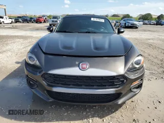 2017 FIAT 124 Spider Lusso z VIN JC1NFAEK7H0123436, wystawiony jako Copart lot #56169965 z przebiegiem 133 320 mil mil oraz Czysty tytuł • Clean title. Historia ofert i sprzedaży dostępna na DreamBid. Obrazek 5.