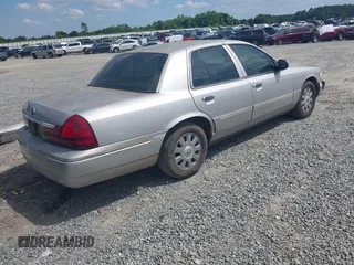 2004 Mercury Grand Marquis LS Premium z VIN 2MHFM75W84X658355, wystawiony jako IAAI lot #42166597 z przebiegiem 214 858 mil mil oraz . Historia ofert i sprzedaży dostępna na DreamBid. Obrazek 4.