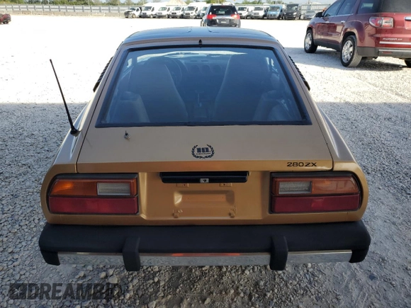 1980 Datsun 280ZX z VIN HS130221335, wystawiony jako Copart lot #81964444 z przebiegiem 135 266 mil mil oraz Szkody całkowita. Historia ofert i sprzedaży dostępna na DreamBid. Obrazek 6.
