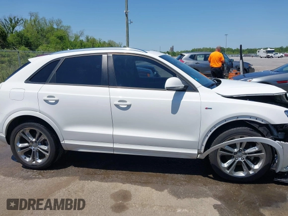 2018 Audi Q3 Premium with VIN WA1BCCFS4JR000455, listed as a IAAI auction lot 42042811 with 57,354 mi miles. Bid and sale history available at carsss.com. Image 13.