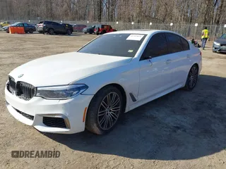 2018 BMW 5 Series M550i xDrive with VIN WBAJB9C53JB036097, listed as a IAAI auction lot 41743031 with 70,164 mi miles and . Bid and sale history available at carsss.com. Image 18.