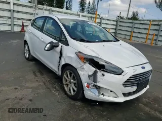 2019 Ford Fiesta SE z VIN 3FADP4EJ5KM106732, wystawiony jako Copart lot #55856145 z przebiegiem 79 778 mil mil oraz Szkoda całkowita • Salvage title. Historia ofert i sprzedaży dostępna na DreamBid. Obrazek 13.