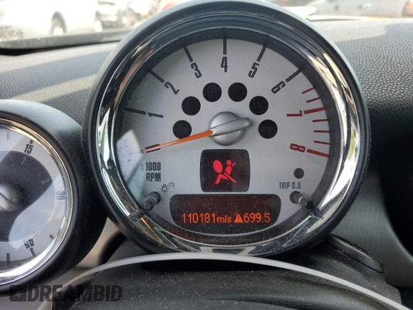 2013 MINI Convertible S with VIN WMWZP3C51DT551373, listed as a Copart auction lot 57878745 with 110,181 mi miles and Salvage title. Bid and sale history available at DreamBid. Image 9.