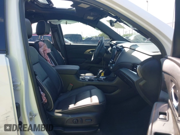 2023 Chevrolet Traverse Premier with VIN 1GNERKKW1PJ309268, listed as a IAAI auction lot 41995379 with 30,294 mi miles and . Bid and sale history available at DreamBid. Image 5.