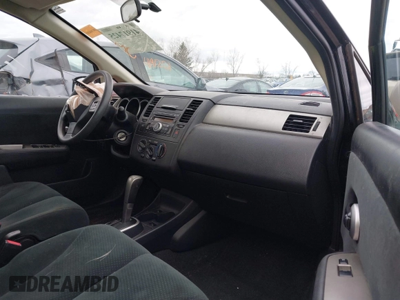 2011 Nissan Versa 1.8 S with VIN 3N1BC1AP7BL378133, listed as a IAAI auction lot 41917425 with 124,228 mi miles. Bid and sale history available at carsss.com. Image 5.