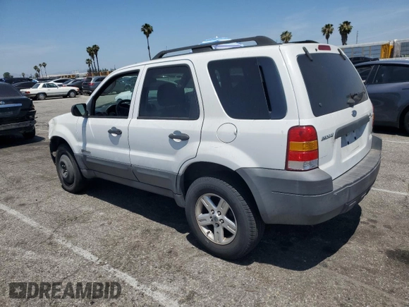 2007 Ford Escape Hybrid with VIN 1FMCU49H87KB61613, listed as a Copart auction lot 58083235 with 129,049 mi miles and Salvage title. Bid and sale history available at DreamBid. Image 2.
