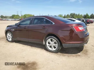 2012 Ford Taurus Limited z VIN 1FAHP2FW4CG112923, wystawiony jako Copart lot #56169085 z przebiegiem 142 687 mil mil oraz Szkoda całkowita • Salvage title. Historia ofert i sprzedaży dostępna na DreamBid. Obrazek 2.