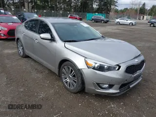 2014 Kia Cadenza Premium z VIN KNALN4D7XE5119727, wystawiony jako IAAI lot #41761021 z przebiegiem 90 713 mil mil oraz . Historia ofert i sprzedaży dostępna na DreamBid. Obrazek 1.