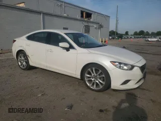 2017 Mazda 6 Touring with VIN JM1GL1V56H1151088, listed as a Copart auction lot 51741435 with 124,331 mi miles and Salvage Title. Bid and sale history available at carsss.com. Image 4.