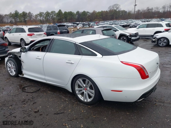 2017 Jaguar XJ with VIN SAJWA2G73H8W04310, listed as a IAAI auction lot 40914491 with 62,102 mi miles. Bid and sale history available at carsss.com. Image 14.