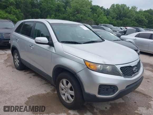 2012 Kia Sorento LX with VIN 5XYKT3A14CG272381, listed as a IAAI auction lot 42077775 with 165,538 mi miles. Bid and sale history available at carsss.com. Image 1.