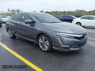 2018 Honda Clarity Plug-In Hybrid Touring with VIN JHMZC5F31JC019474, listed as a IAAI auction lot 41864595 with 154,415 mi miles. Bid and sale history available at carsss.com. Image 1.