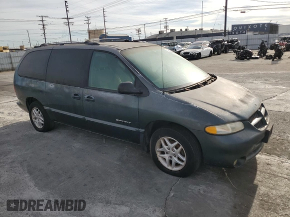 2000 Dodge Caravan SE with VIN 1B4GP44R6YB802320, listed as a Copart auction lot 79336244 with 163,919 mi miles and Clean Title. Bid and sale history available at DreamBid. Image 4.