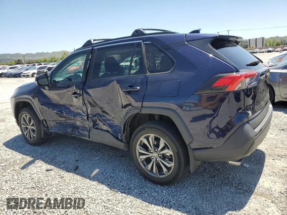 2022 Toyota RAV4 Hybrid XLE Premium z VIN 4T3B6RFV5NU097584, wystawiony jako Copart lot #56163835 z przebiegiem 25 016 mil mil oraz Szkoda całkowita • Salvage title. Historia ofert i sprzedaży dostępna na DreamBid. Obrazek 2.
