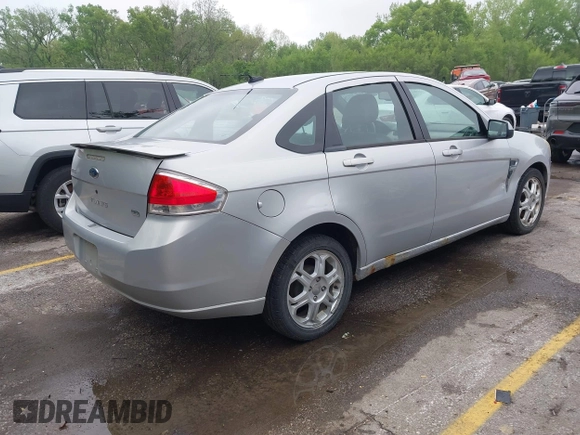 2008 Ford Focus SE with VIN 1FAHP35NX8W152337, listed as a IAAI auction lot 42114878 with 239,583 mi miles. Bid and sale history available at carsss.com. Image 4.