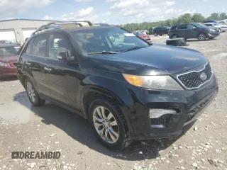 2012 Kia Sorento SX z VIN 5XYKW4A28CG193611, wystawiony jako Copart lot #57659935 z przebiegiem 203 349 mil mil oraz Szkoda całkowita • Salvage title. Historia ofert i sprzedaży dostępna na DreamBid. Obrazek 4.