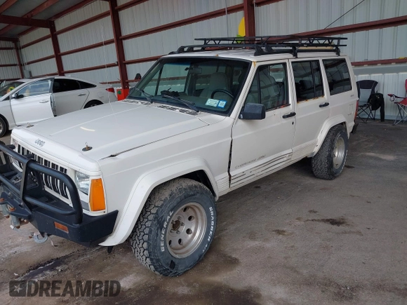 1996 Jeep Cherokee Sport with VIN 1J4FJ68S5TL259449, listed as a IAAI auction lot 42376697 with 72,835 mi miles and . Bid and sale history available at DreamBid. Image 6.