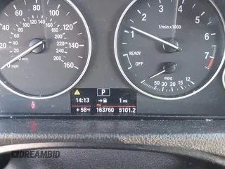 2014 BMW 3 Series 328i with VIN WBA3C1C55EK117180, listed as a IAAI auction lot 41389969 with 163,760 mi miles. Bid and sale history available at carsss.com. Image 7.