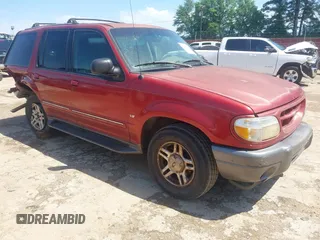2000 Ford Explorer XLT z VIN 1FMZU63P7YZA68094, wystawiony jako IAAI lot #42188950 z przebiegiem 210 747 mil mil oraz . Historia ofert i sprzedaży dostępna na DreamBid. Obrazek 1.