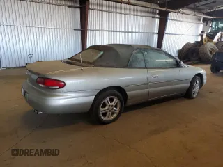 2000 Chrysler Sebring JXi z VIN 3C3EL55H7YT264635, wystawiony jako Copart lot #47325535 z przebiegiem 110 000 mil mil oraz Szkody całkowita. Historia ofert i sprzedaży dostępna na DreamBid. Obrazek 3.