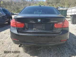 2013 BMW 3 Series 328i z VIN WBA3C1C58DF437018, wystawiony jako Copart lot #52147355 z przebiegiem 161 247 mil mil oraz Szkody całkowita. Historia ofert i sprzedaży dostępna na DreamBid. Obrazek 6.
