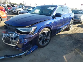 2021 Audi e-tron Premium with VIN WA1AAAGE4MB014383, listed as a IAAI auction lot 41298787 with 63,214 mi miles. Bid and sale history available at carsss.com. Image 18.