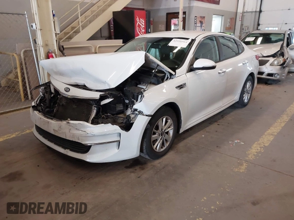 2017 Kia Optima LX with VIN 5XXGT4L35HG135391, listed as a IAAI auction lot 42316564 with 119,940 mi miles and . Bid and sale history available at DreamBid. Image 2.
