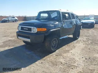 2008 Toyota FJ Cruiser with VIN JTEBU11F38K016727, listed as a IAAI auction lot 41514574 with 173,282 mi miles. Bid and sale history available at carsss.com. Image 2.