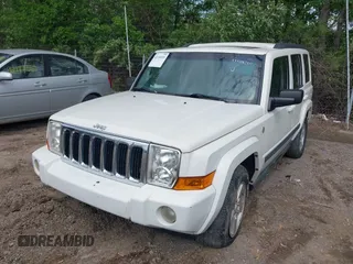 2007 Jeep Commander with VIN 1J8HG48N77C611652, listed as a IAAI auction lot 42144524 with 211,976 mi miles. Bid and sale history available at carsss.com. Image 2.