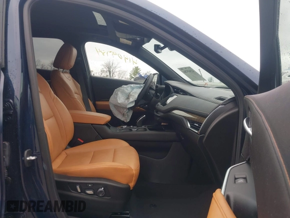 2021 Cadillac XT4 AWD Sport with VIN 1GYFZFR45MF053573, listed as a IAAI auction lot 41909784 with 36,309 mi miles and . Bid and sale history available at DreamBid. Image 5.