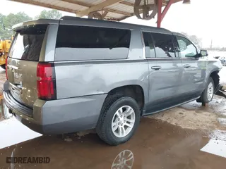 2020 Chevrolet Suburban LT with VIN 1GNSKHKC0LR282818, listed as a IAAI auction lot 41539280 with 116,041 mi miles. Bid and sale history available at carsss.com. Image 4.