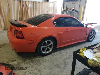 2004 Ford Mustang Premium Mach 1 with VIN 1FAFP42R24F139192, listed as a Copart auction lot 82810874 with Not provided miles and Salvage title. Bid and sale history available at DreamBid. Image 3.