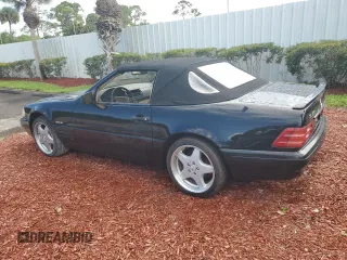 1997 Mercedes-Benz SL-Class with VIN WDBFA67F3VF147355, listed as a Copart auction lot 74295594 with 0 mi miles and Salvage Title. Bid and sale history available at carsss.com. Image 2.