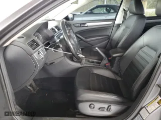 2015 Volkswagen Passat 1.8T Sport with VIN 1VWBT7A35FC009590, listed as a Copart auction lot 69564634 with 61,959 mi miles and Salvage Title. Bid and sale history available at carsss.com. Image 7.