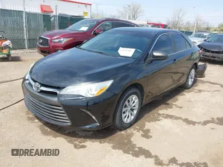 2016 Toyota Camry XLE with VIN 4T4BF1FK0GR581297, listed as a IAAI auction lot 42059507 with 151,777 mi miles. Bid and sale history available at carsss.com. Image 2.