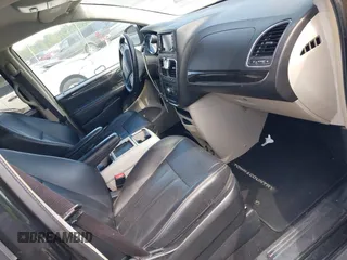 2016 Chrysler Town & Country Touring with VIN 2C4RC1BG8GR297243, listed as a IAAI auction lot 42143705 with 140,728 mi miles. Bid and sale history available at carsss.com. Image 5.